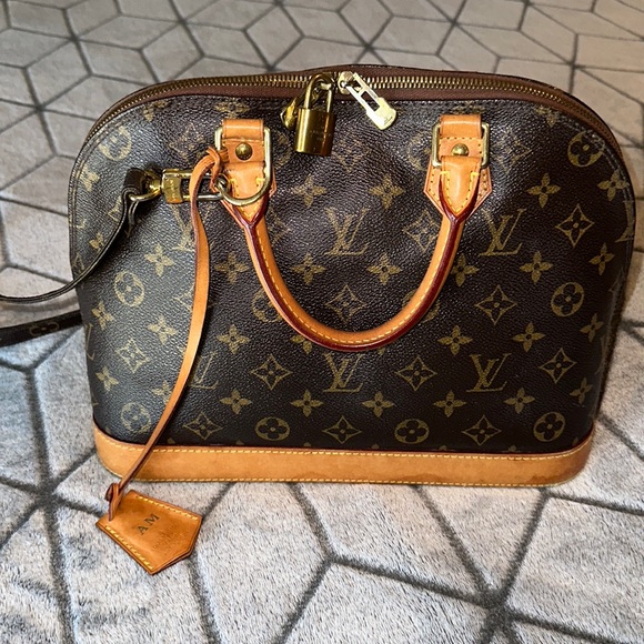 Authentic Louis Vuitton Monogram Alma satchel - Picture 1 of 13
